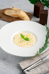 Creamy risotto 4 cheeses with parmesan, gorgonzola, brie and camembert. A dish with rice and cheese