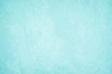 Pastel blue and white concrete stone texture for background in summer wallpaper. Cement and sand wall of tone vintage. Concrete abstract wall of light cyan color, cement texture mint green for design.