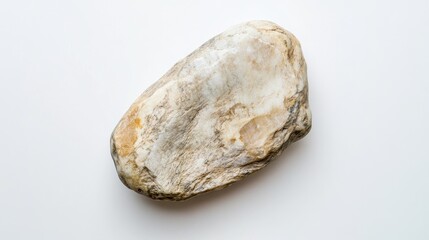 Obraz premium A flat lay of a smooth white stone centered on a plain white background, offering a sense of tranquility.