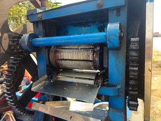 Close up view of a diesel powered motorized sugarcane machine, Sugarcane juice extraction machine