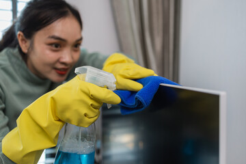 a company's cleaning lady is diligently cleaning the executive's office, the cleaning lady wears...