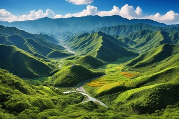 mountains with a river running through them and a valley in the middle