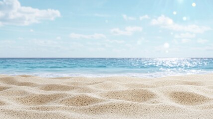 Fototapeta premium Serene sandy beach with a clear blue ocean, perfect for a tranquil getaway or relaxation under the sun.