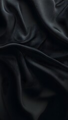 Fototapeta premium Dark fabric drapes in soft folds creating shadows