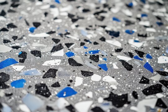 A new gray epoxy coating mixed with blue black and white plastic chips