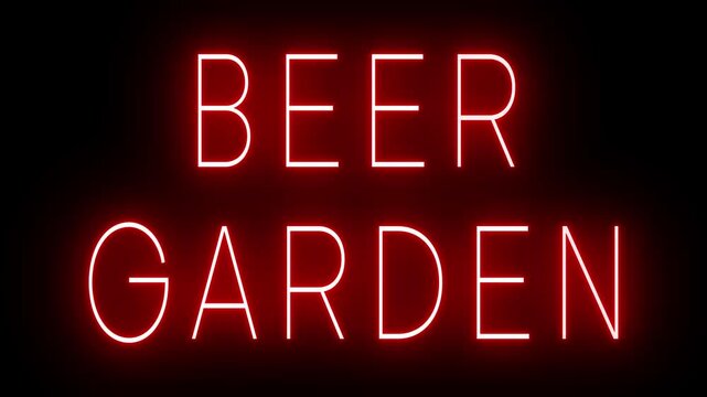 Flickering red retro style neon sign glowing against a black background for BEER GARDEN