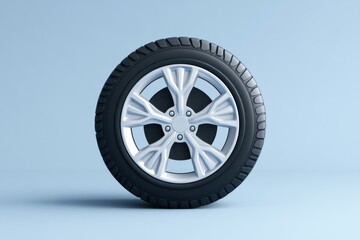 Fototapeta premium A Single Car Tire and Wheel Displayed on a Plain Background
