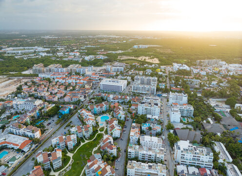A city view with many buildings and a pool