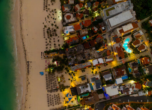 A beach with a city in the background