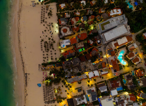 A beach with a city in the background