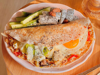 Savoury Tortilla wrap recipe for breakfast. Bruch menu. Easy home cooking. Happy holidays. Delicious food. Quick and Easy tortilla recipes. Vegetables. Home cooking. Breakfast time. Apartment living.