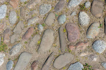 Cobbled Market Square (surface underfoot), cobble stone. Stary Sącz, Poland.