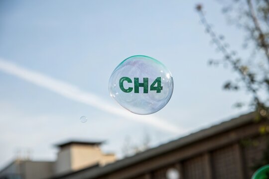 Methane CH4 bubble floating in the air. Environment pollution gas release