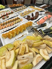 Variety of cakes as dessert and guava on display on a Nile cruise, Egypt