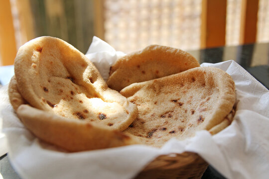 Egyptian flatbread Aish Baladi in a Luxor restaurant, Egypt