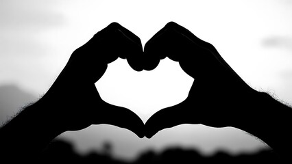 Silhouette of Hands Forming Heart Shape