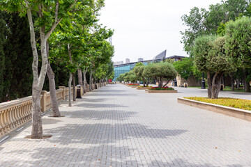 Fototapeta premium Picturesque embankment and boulevard in center of Baku, on the shore of the Caspian Sea. Republic of Azerbaijan
