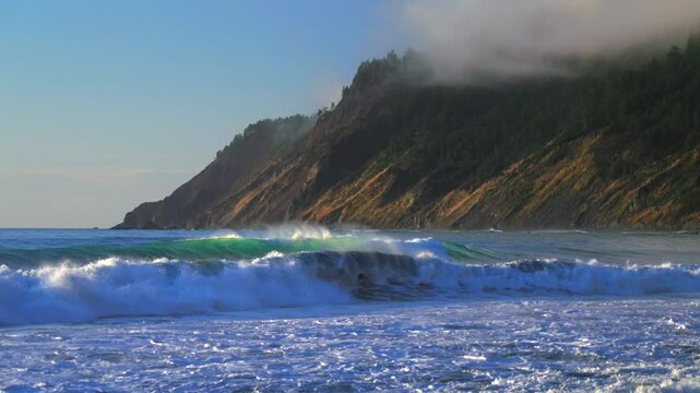 Pacific Ocean surf waves USAL Beach Campground sunset black sand waves Lost Coast Trail California sunny afternoon mist fog on bluffs rugged coastline remote untouched Sinkhole Wilderness static