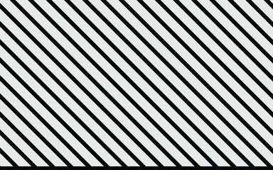 A pattern of diagonal black lines is presented against a light gray background. The lines are evenly spaced and run parallel, creating a striped effect. The image is simple and geometric, with a high 