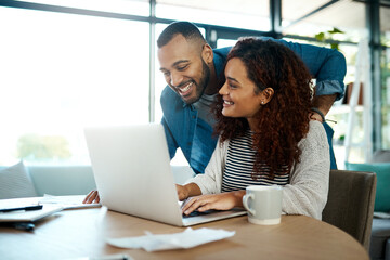 Couple, smile and laptop for financial planning, budget discussion and investment success together....