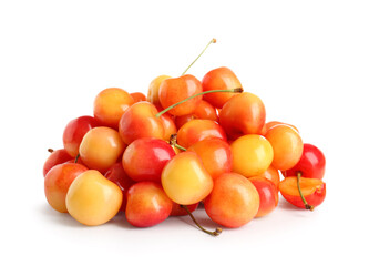 Heap of sweet yellow cherries on white background
