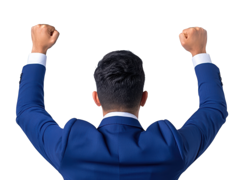 A man in a blue suit raises his arms triumphantly, expressing celebration and achievement.