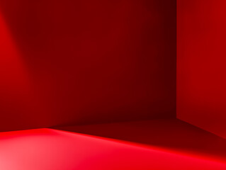 Obraz premium Vibrant red interior space with dramatic shadows, perfect for design and artistic purposes.
