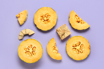 Pieces of sweet melon on lilac background