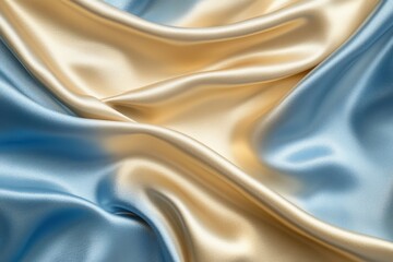 Obraz premium Elegant Silk Fabric: Luxurious, flowing silk fabric in a blend of gold and blue hues, beautifully draped, offering a tactile experience of opulence and sophistication.