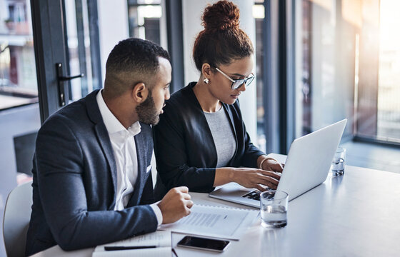 Business, people or planning with laptop in office for trial preparation, drafting legal document or case research. Lawyer, paralegal and typing court filing for client contract, teamwork or strategy