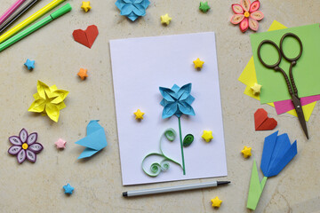 Crafting Handmade Greeting Card Featuring Origami, Quilling. Creative DIY Craft Workspace with...