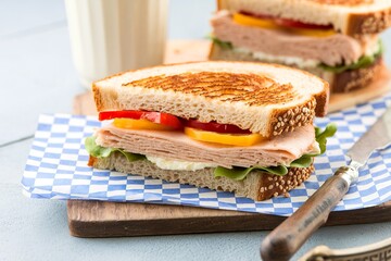 Breakfast sandwich with turkey, ricotta and roasted bell pepper