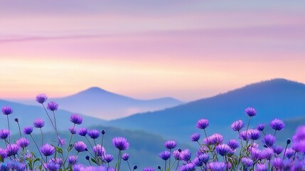 Obraz premium A field of purple flowers in front of a majestic mountain range with a stunning pink-blue sky as the backdrop