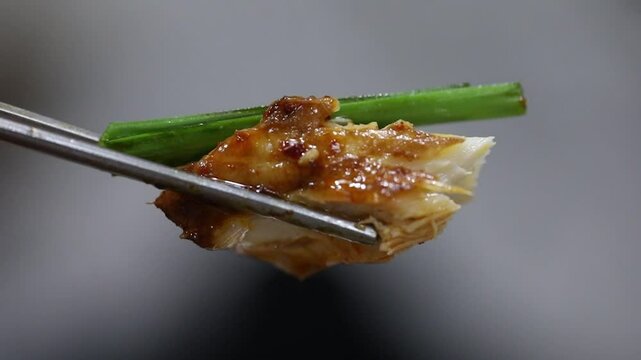 braised mackerel with chopsticks
