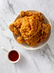 fried chicken on white table 