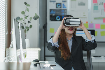 Businesswoman wearing vr headset in modern office exploring virtual reality