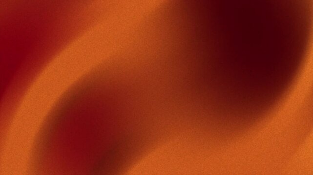 Plain orange background with a blurry, black brown copper red burnt orange yellow background, black brown copper red burnt orange yellow background, spot is suitable for adding text or logo for video