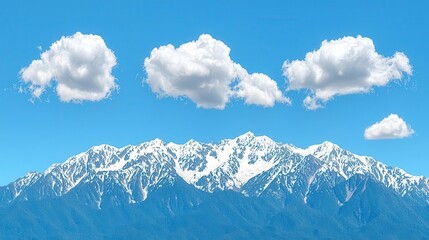 Fototapeta premium Snowy mountain peaks under a clear blue sky with fluffy white clouds.