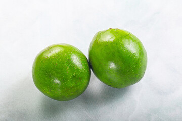 Two ripe green exotic avocado fruit