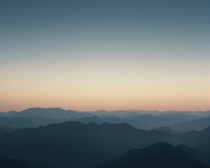 Fototapeta premium A serene landscape showcasing layered mountains under a gradient sky at dusk, evoking tranquility and natural beauty.