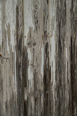 old wood structure with white paint falling off