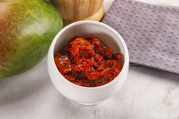 Spicy pickled raw green mango