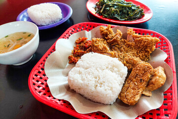 Crispy chicken, vegetables, soup and kale are ready to eat