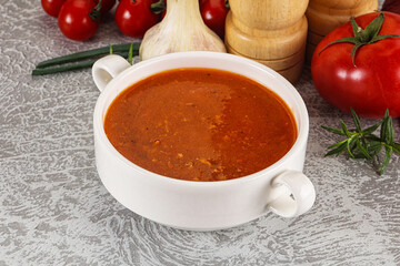 Hot tomato soup with diced chicken
