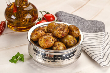 Baked mini potato with herbs