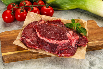 Raw beef cheeks cut for cooking
