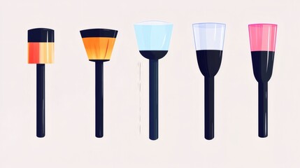 Variety of paintbrush designs and colors displayed on a neutral background in an artistic setup