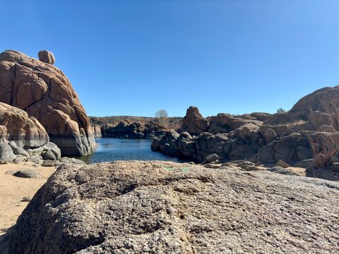 Rocky shoreline and boulder formations at Watson Lake in Prescott, AZ