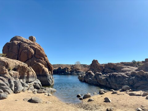 Boulder formations and sandy shoreline at Watson Lake, Prescott, AZ