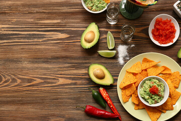 Traditional Mexican food and tequila on wooden background. Cinco de Mayo (Fifth of May) celebration